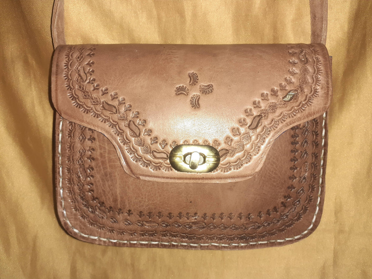Bolso trapecio labrado click