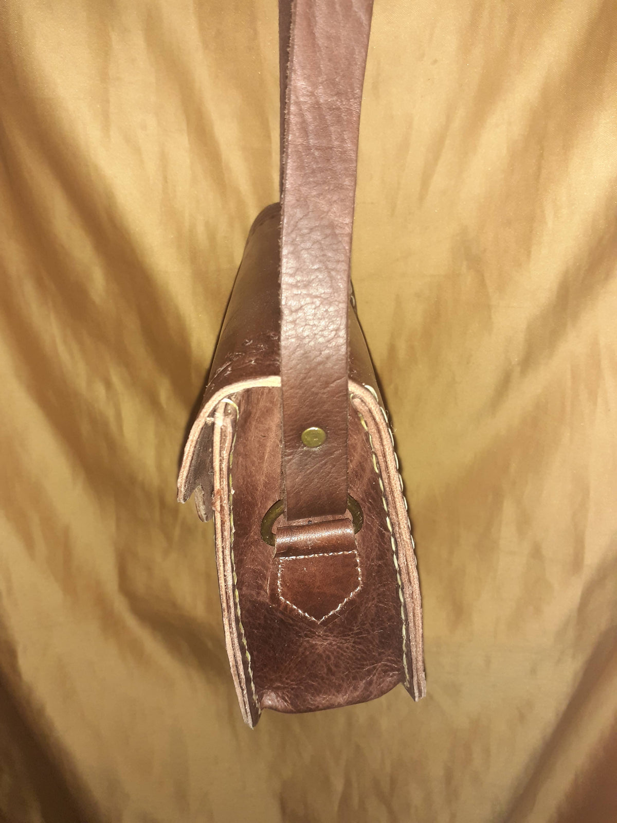 Bolso trapecio labrado click