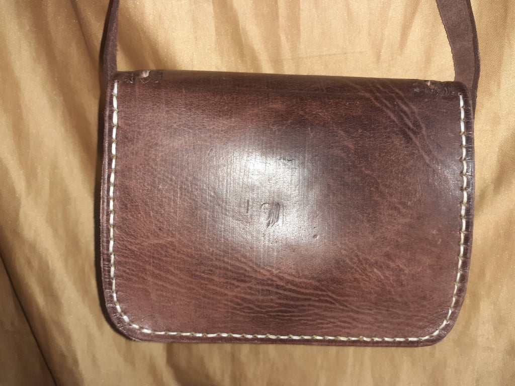 Bolso trapecio labrado click