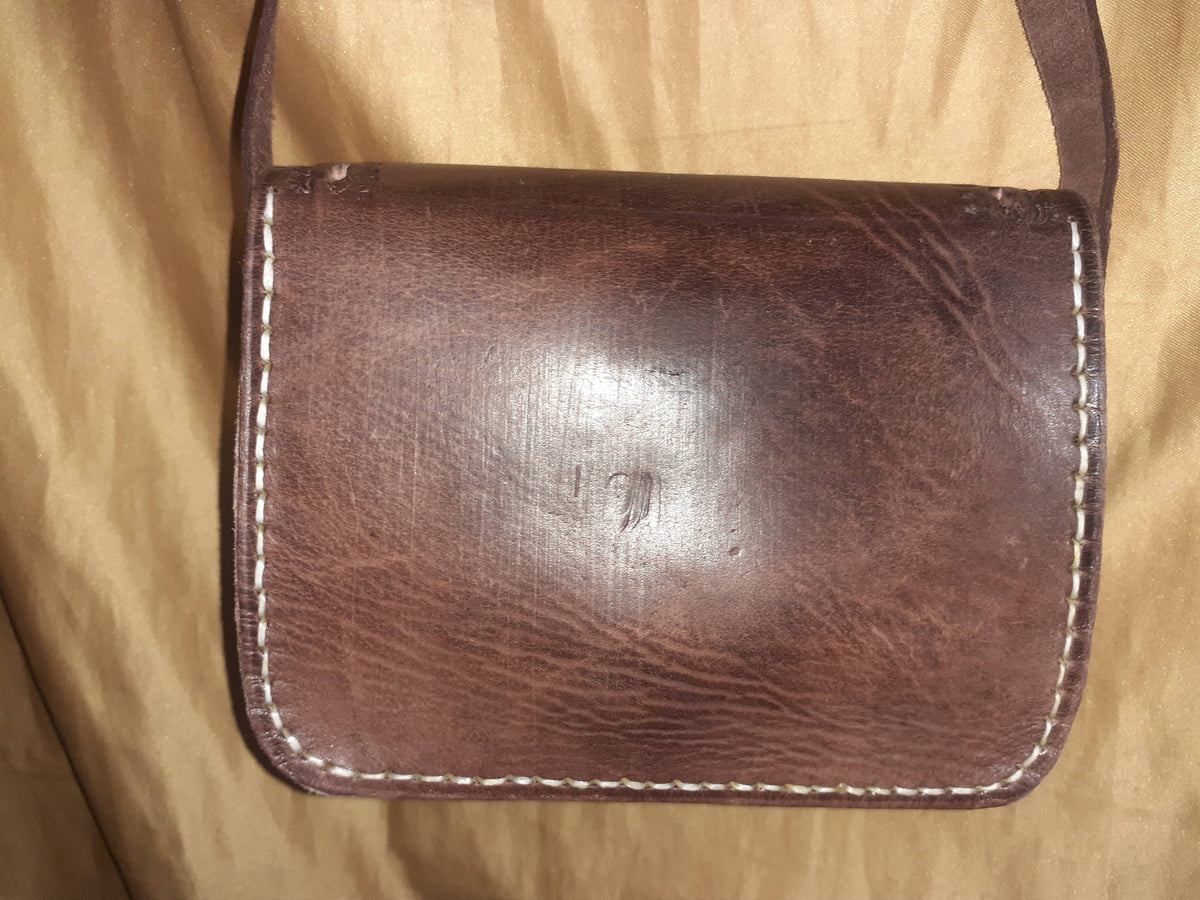Bolso trapecio labrado click