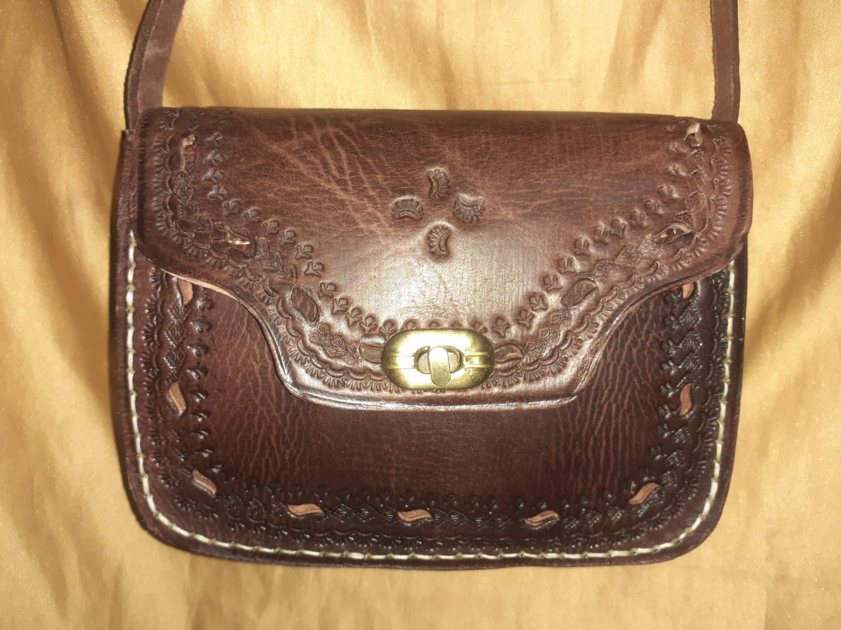 Bolso trapecio labrado click