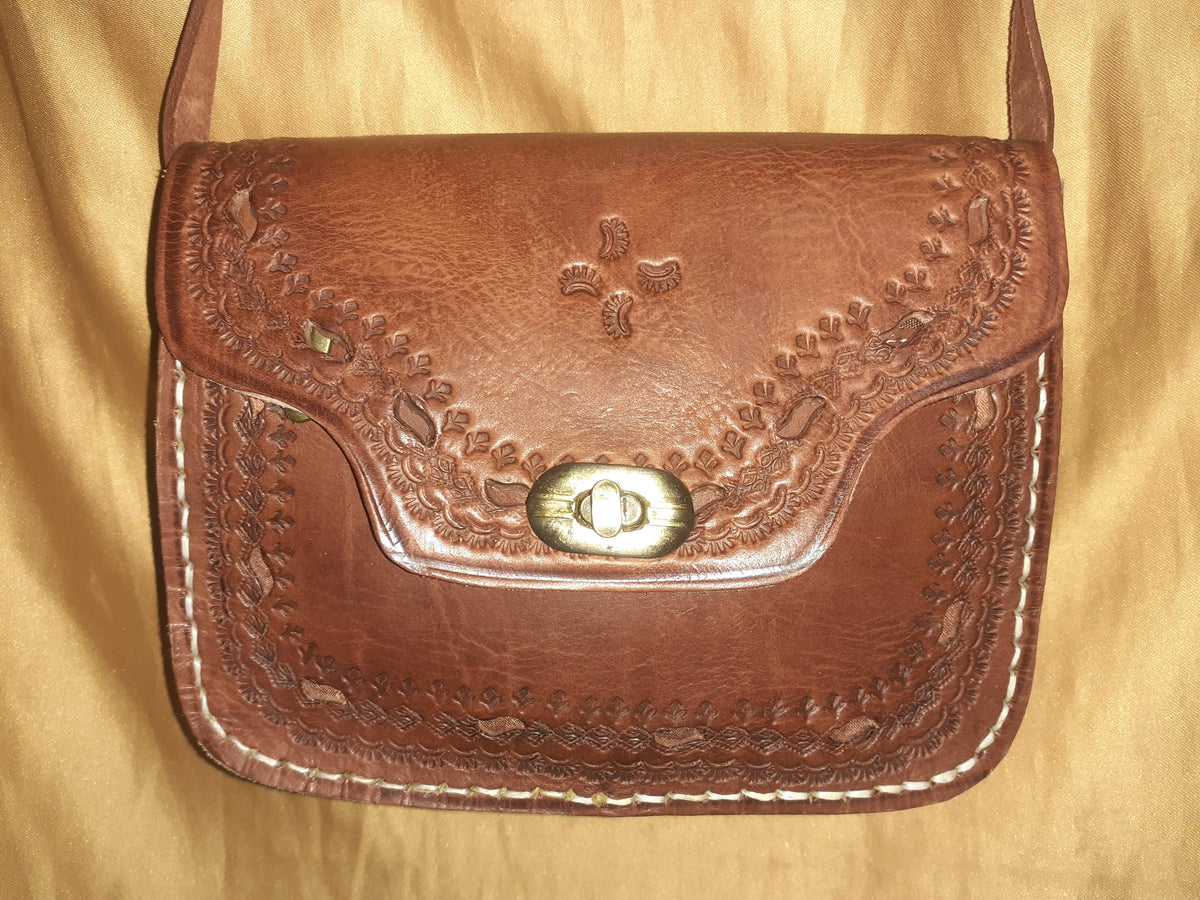 Bolso trapecio labrado click