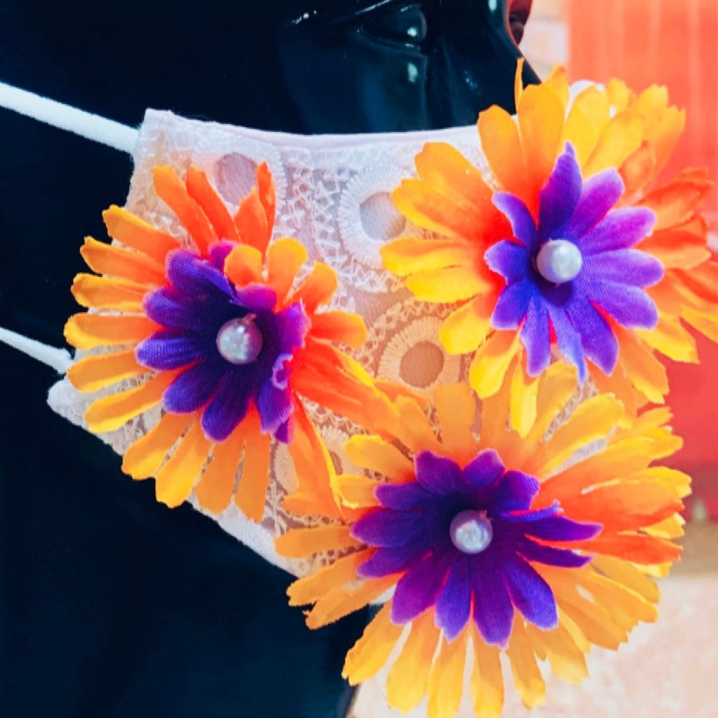 Face mask with orange and purple flowers