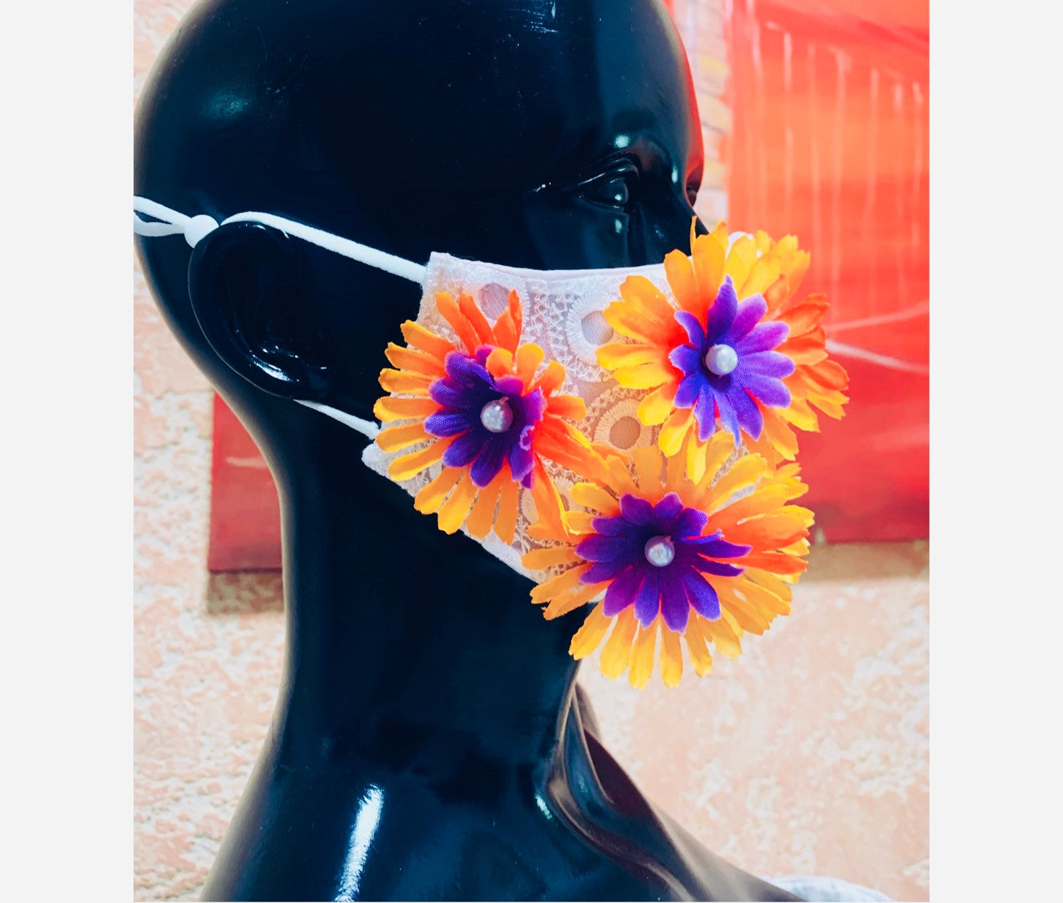 Face mask with orange and purple flowers